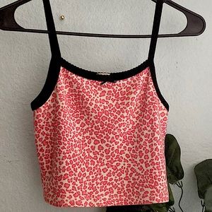 I’m selling an animal print crop top. It’s is size small colors are pink, white